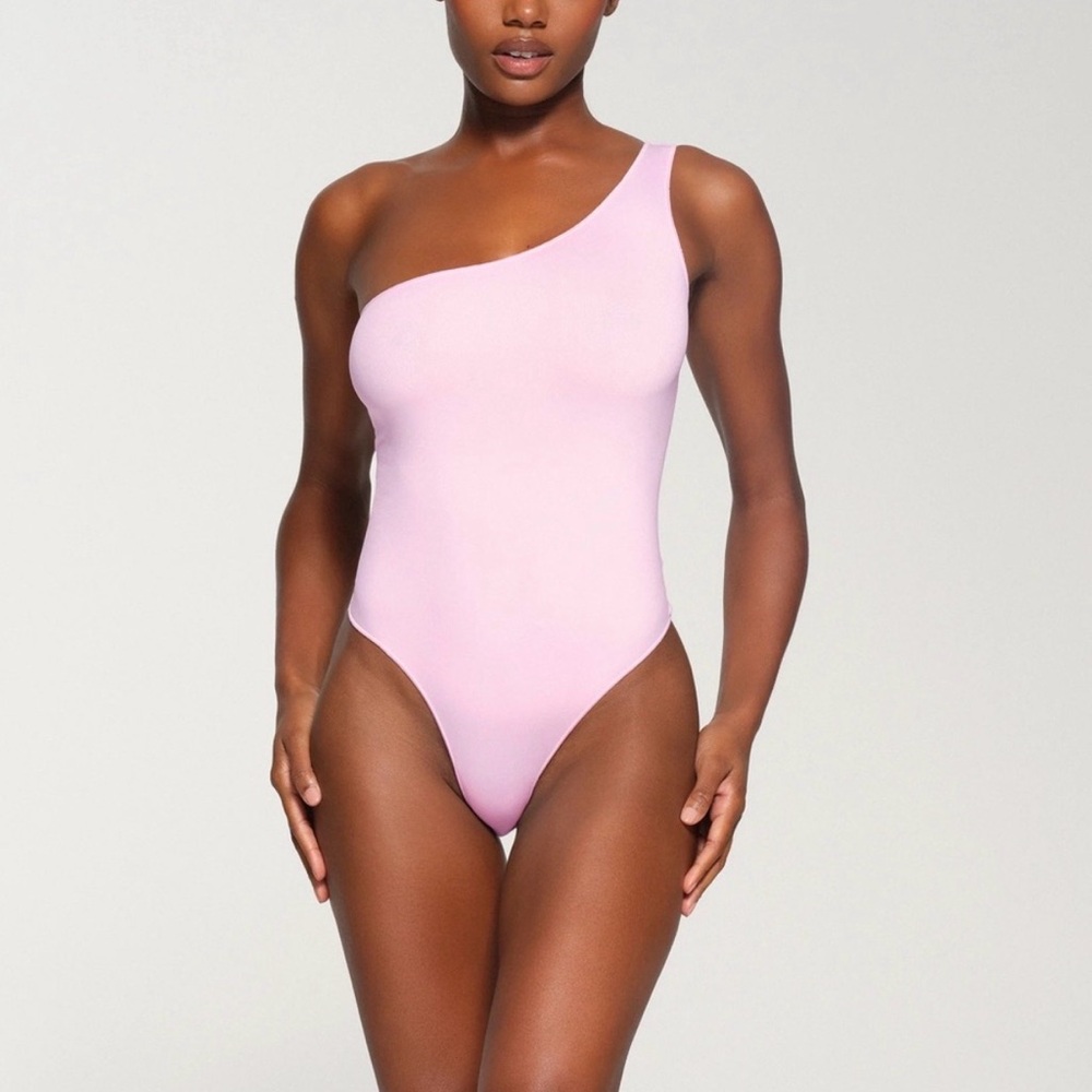 SKIMS One-Shoulder Bodysuit in Soft Pink